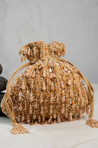 Gold silk embroidered potli bag