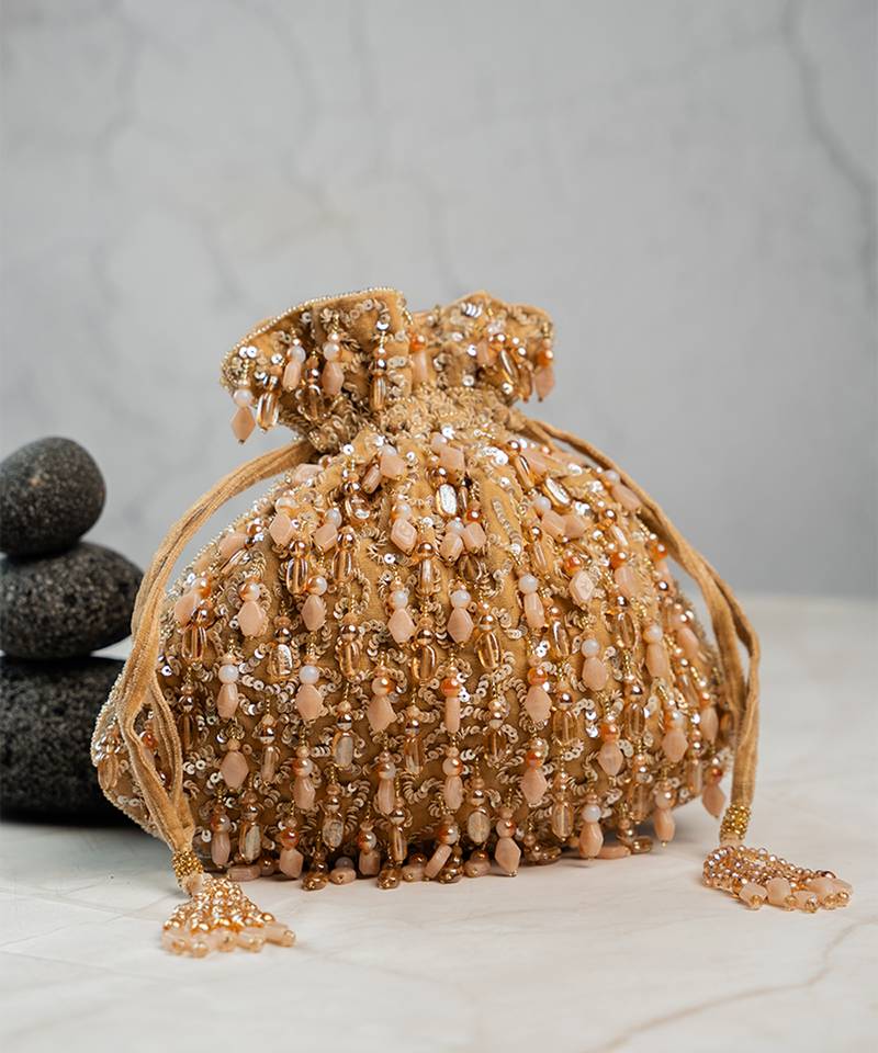 Gold silk embroidered potli bag