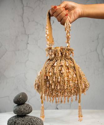gold beaded tassel embroidered silk potli bag 2