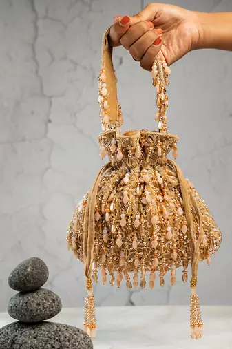 gold beaded tassel embroidered silk potli bag