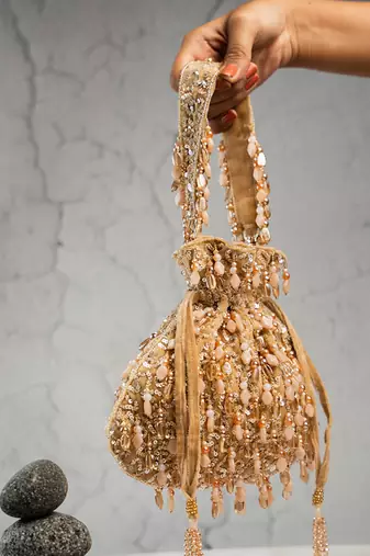 gold beaded tassel embroidered silk potli bag