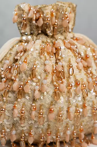 gold peach beaded embroidered silk potli bag