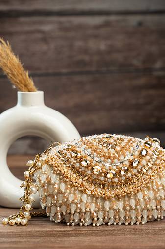 Gold silk embroidered clutch