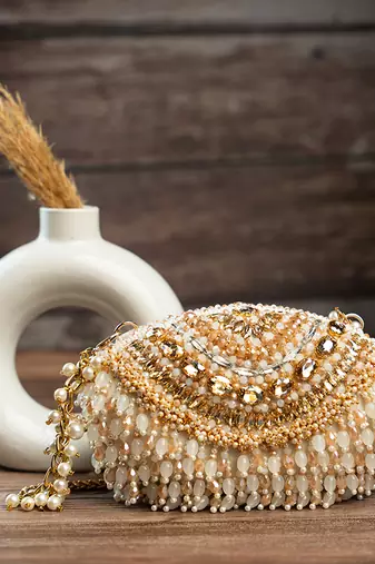 Gold silk embroidered clutch