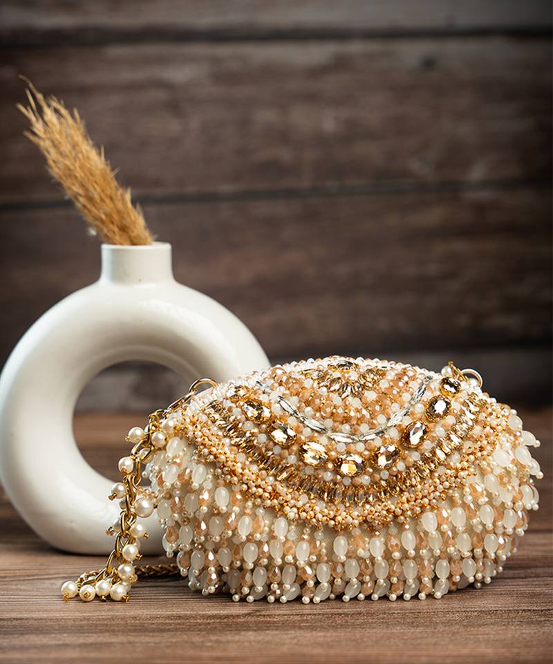 Gold silk embroidered clutch