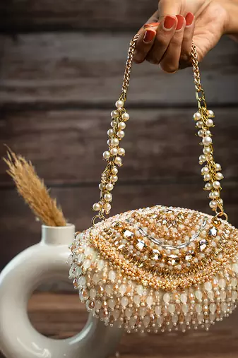 gold beaded tassel embroidered silk clutch