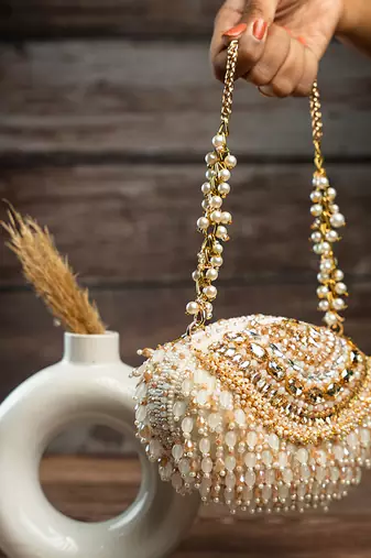 gold beaded tassel embroidered silk clutch