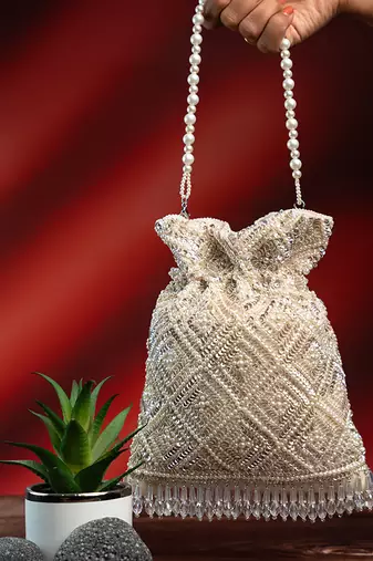 white criss-cross pearl embroidered silk potli bag