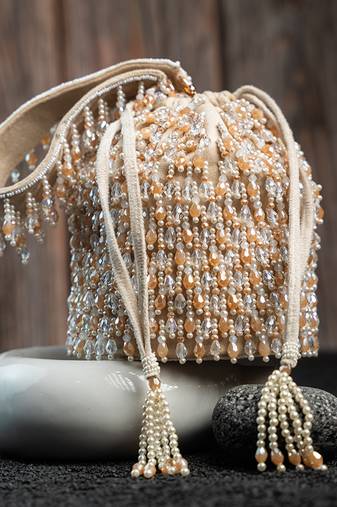 White suede embroidered potli bag 