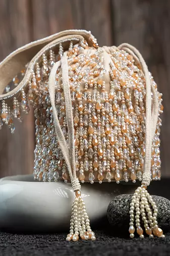 White suede embroidered potli bag 