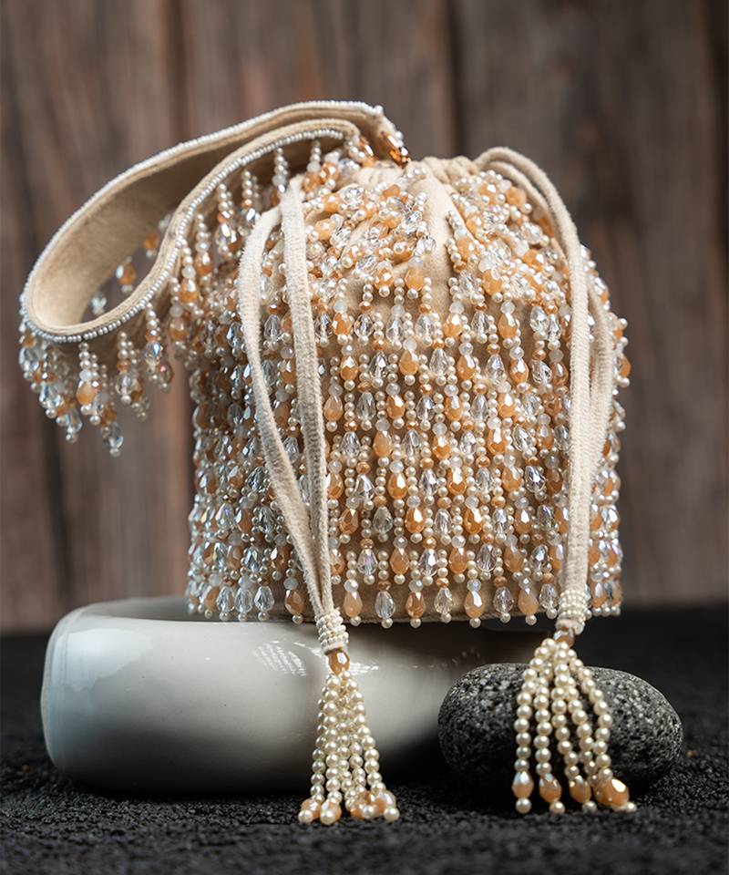 White suede embroidered potli bag 