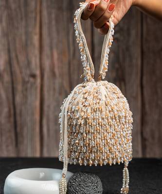 white beaded embroidered suede potli bag 1