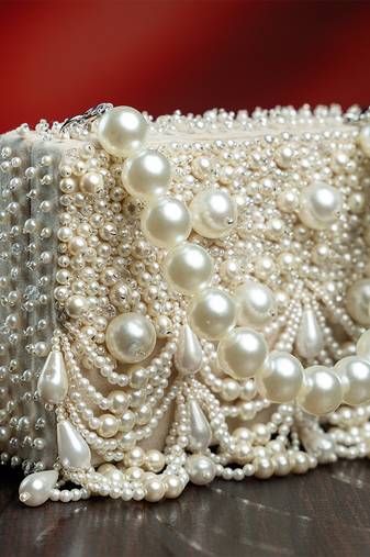 White suede embroidered clutch 