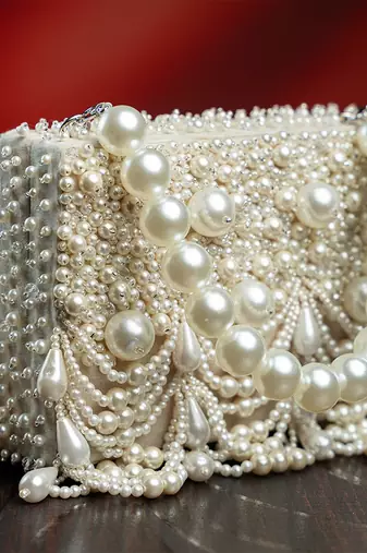 White suede embroidered clutch 