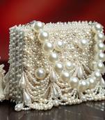 White suede embroidered clutch 