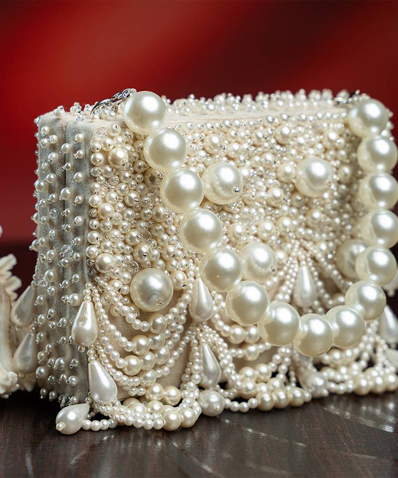 White suede embroidered clutch 