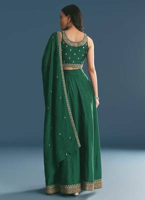 GREEN SEQUINED EMBROIDERY WORK COTTON SILK WEDDING WEAR LEHENGA CHOLI WITH DUPATTA. 2