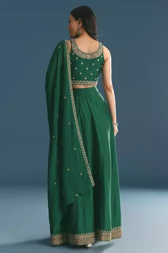 GREEN SEQUINED EMBROIDERY WORK COTTON SILK WEDDING WEAR LEHENGA CHOLI WITH DUPATTA.