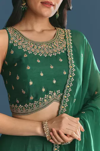 GREEN SEQUINED EMBROIDERY WORK COTTON SILK WEDDING WEAR LEHENGA CHOLI WITH DUPATTA.