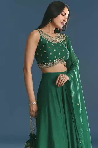 GREEN SEQUINED EMBROIDERY WORK COTTON SILK WEDDING WEAR LEHENGA CHOLI WITH DUPATTA.
