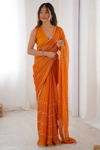 Orange color beads work celebrity style saree with blouse