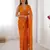 Orange color beads work celebrity style saree with blouse