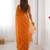 Orange color beads work celebrity style saree with blouse