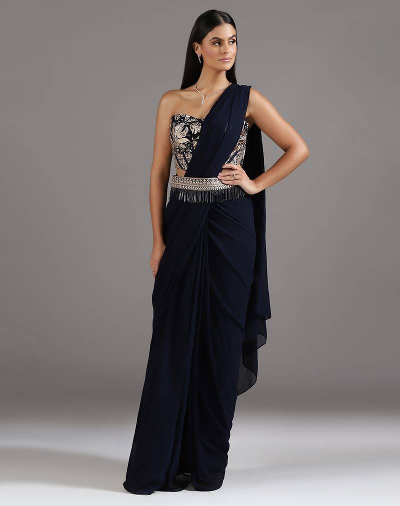 Blue plain georgette saree with embroidered blouse & belt