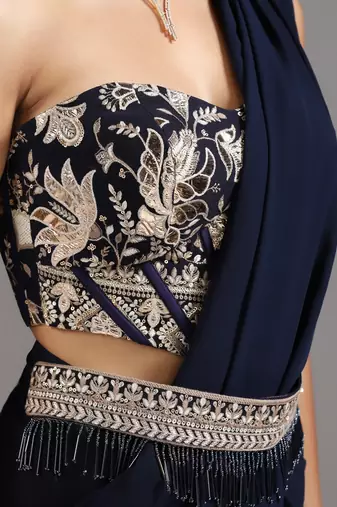 Blue plain georgette saree with embroidered blouse & belt
