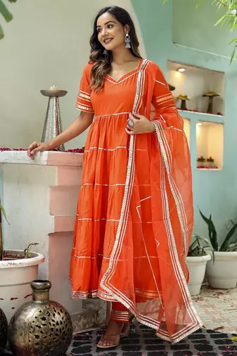 Orange cotton solid & gota patti work anarkali kurta bottom dupatta set