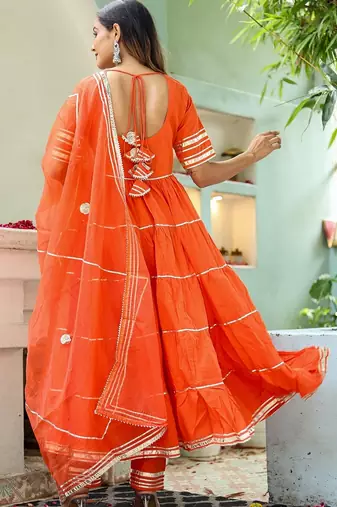 Orange cotton solid & gota patti work anarkali kurta bottom dupatta set