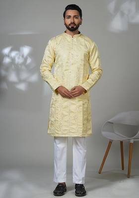 Yellow blended cotton embroidered kurta pajama for mens 1