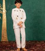 Boys white silk kurta and pants with handwork acrylic bundi jacket
