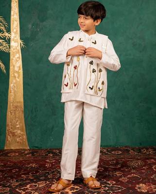 Boys white silk kurta and pants with handwork acrylic bundi jacket 3