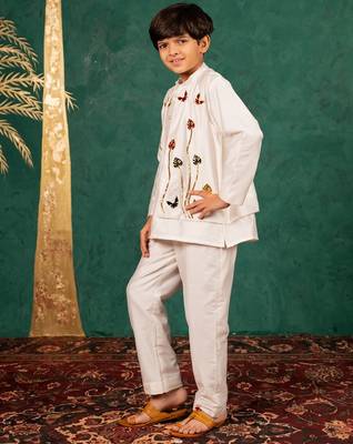Boys white silk kurta and pants with handwork acrylic bundi jacket 5