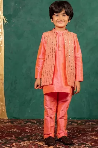 Boys bright salmon coloured kurta and pant with georgette mirror work bundi jacket