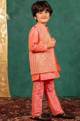 Boys bright salmon coloured kurta and pant with georgette mirror work bundi jacket