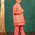 Boys bright salmon coloured kurta and pant with georgette mirror work bundi jacket