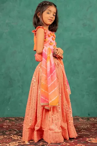 Girls pink salmon coloured mirror handworked top and mirror embroidered georgette lehenga with dupatta