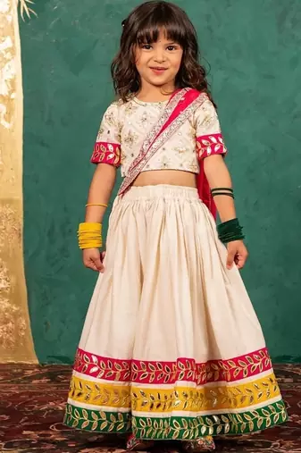 Girls off-white elbow sleeve top and lehenga with georgette dupatta