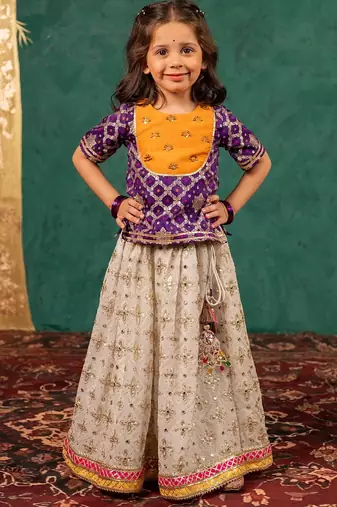 Girls handworked dark purple top and off-white lehenga