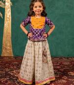 Girls handworked dark purple top and off-white lehenga