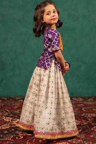 Girls handworked dark purple top and off-white lehenga