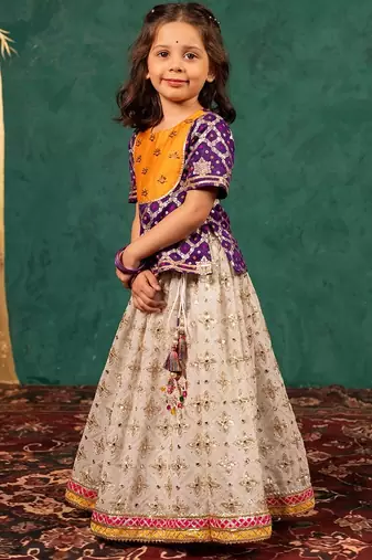 Girls handworked dark purple top and off-white lehenga