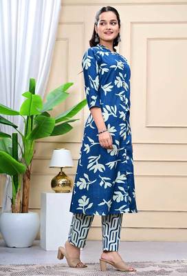 Women blue cotton printed & trim work a-line kurta & bottom set 3