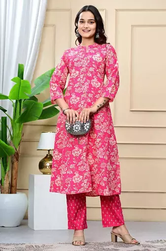 Women  pink cotton printed & trim work a-line kurta & bottom set