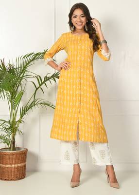 Women yellow rayon printed & trim work kurta bottom set 1