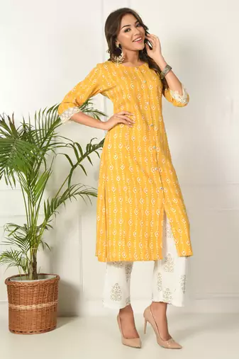Women yellow rayon printed & trim work kurta bottom set