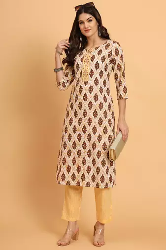 Women yellow cotton printed & embroidred trim work kurta bottom set
