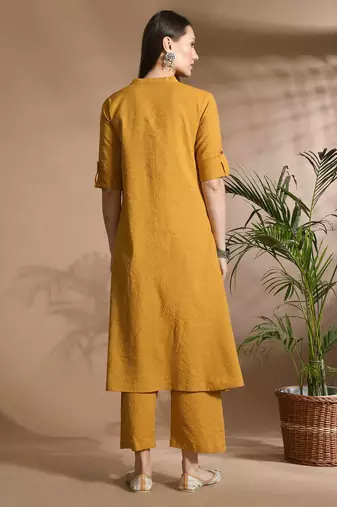 Women mustard cotton katha & trim work kurta bottom set